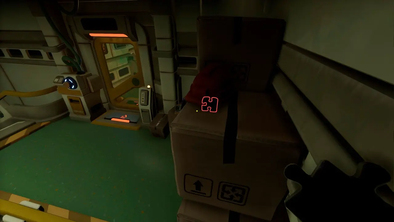 We Were Here Tomorrow puzzle piece 9 beside a hard hat on the boxes