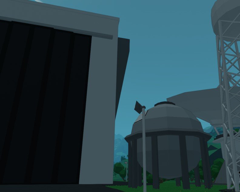 Approximately Up close-up of fuel tank in front of assembly structure at Earth base