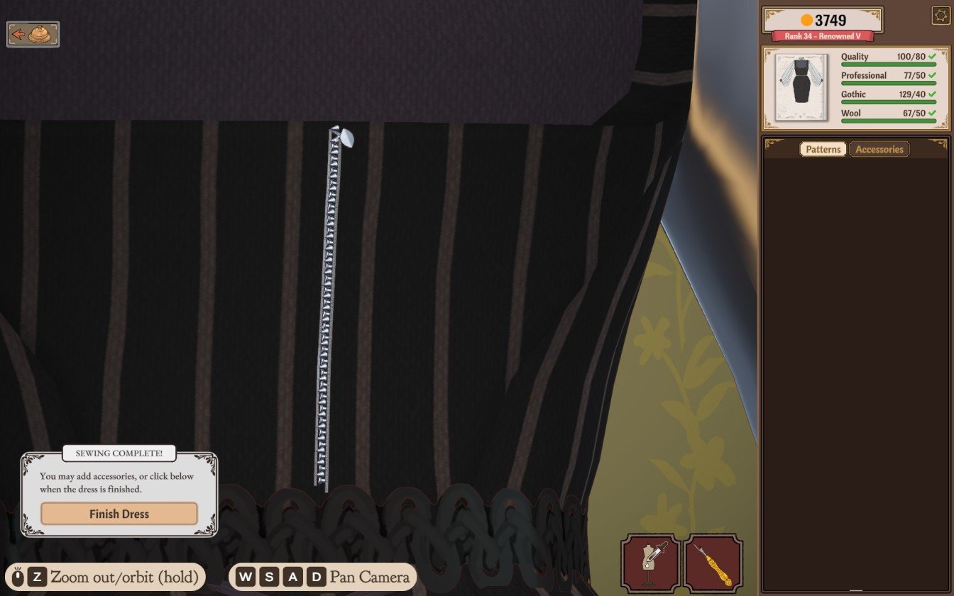 Dressmaker costume showing a zipper pull made from a bell trim decoration enhancing realism
